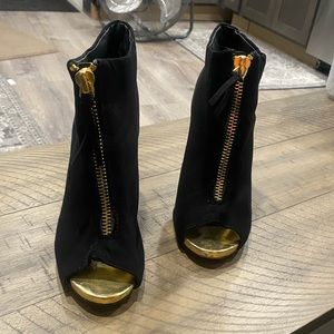 Size 6.5 black velvety heels.